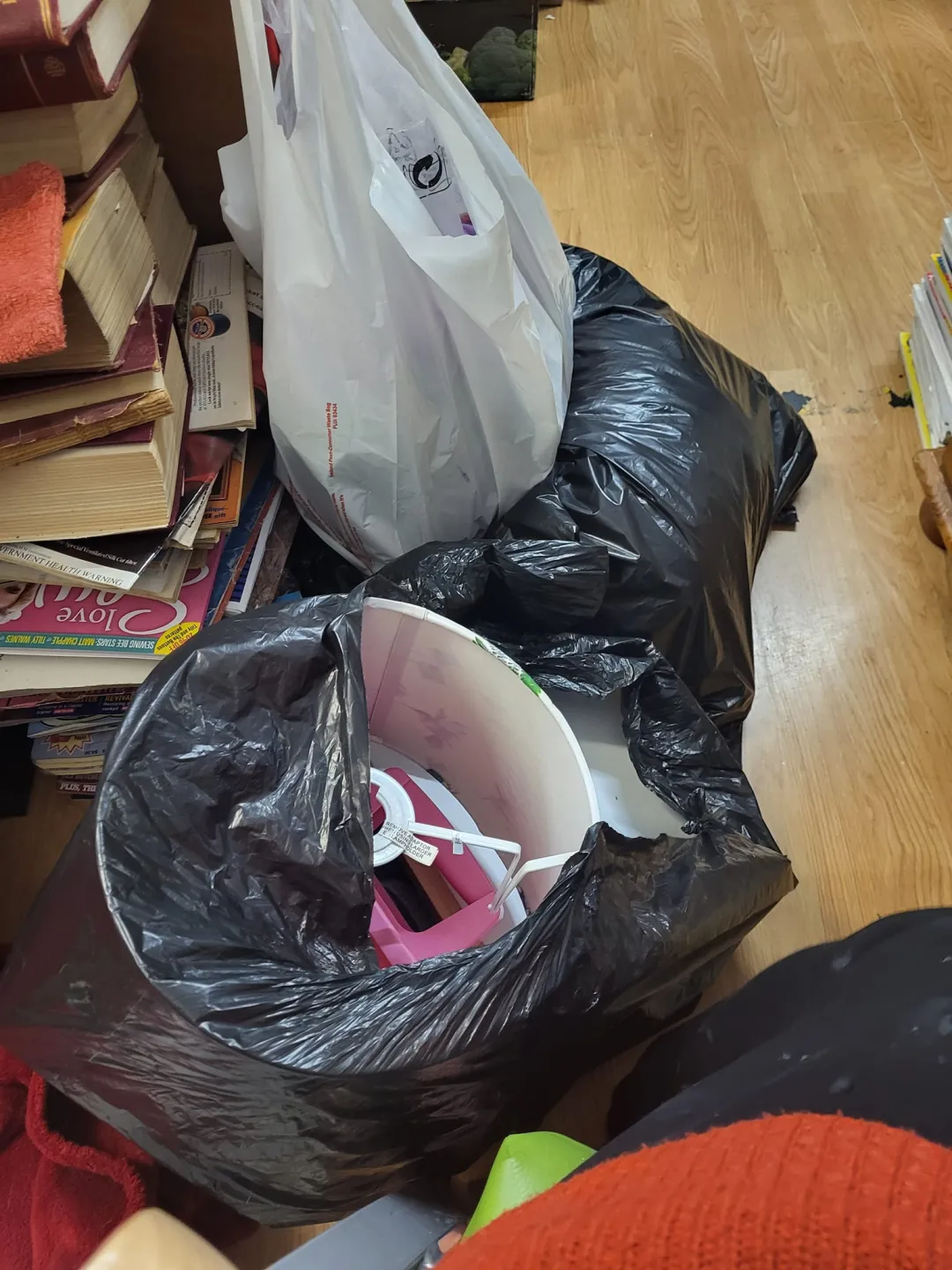 Photo from Jayne's Baby Bank (main page), 5 Oct 2024: Donations to be weighed and priced.