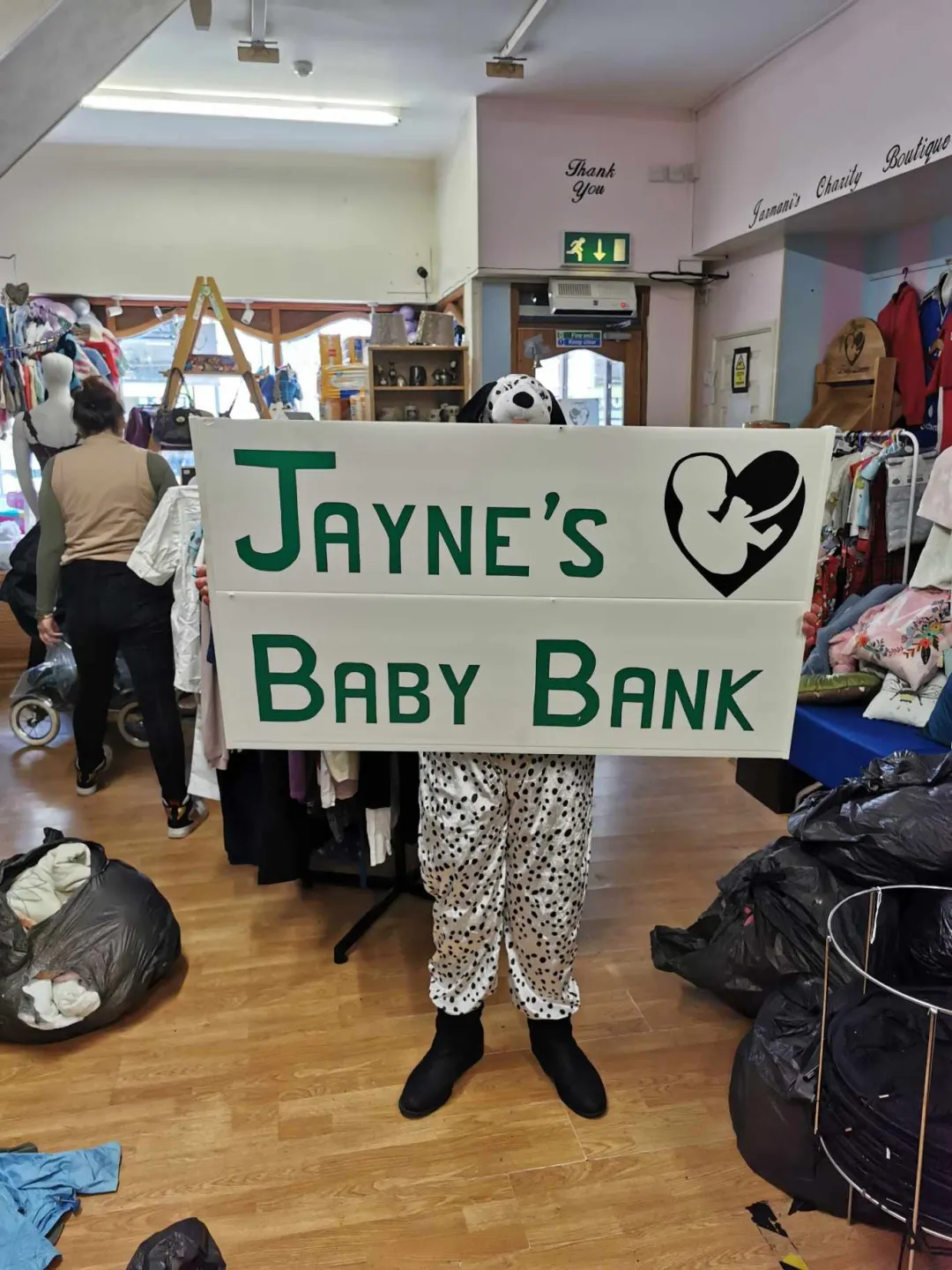 Photo from Jayne's Baby Bank (main page), 4 Apr 2024: Karen one of our volunteers from Pontypoool shop - off in the town with our sign!! Employee of the month!!