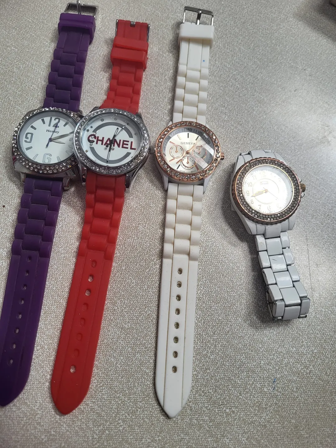Photo from Jayne's Baby Bank (main page), 20 Apr 2024: Watches just come on £10 each the red and purple one please - the two white ones £5 please