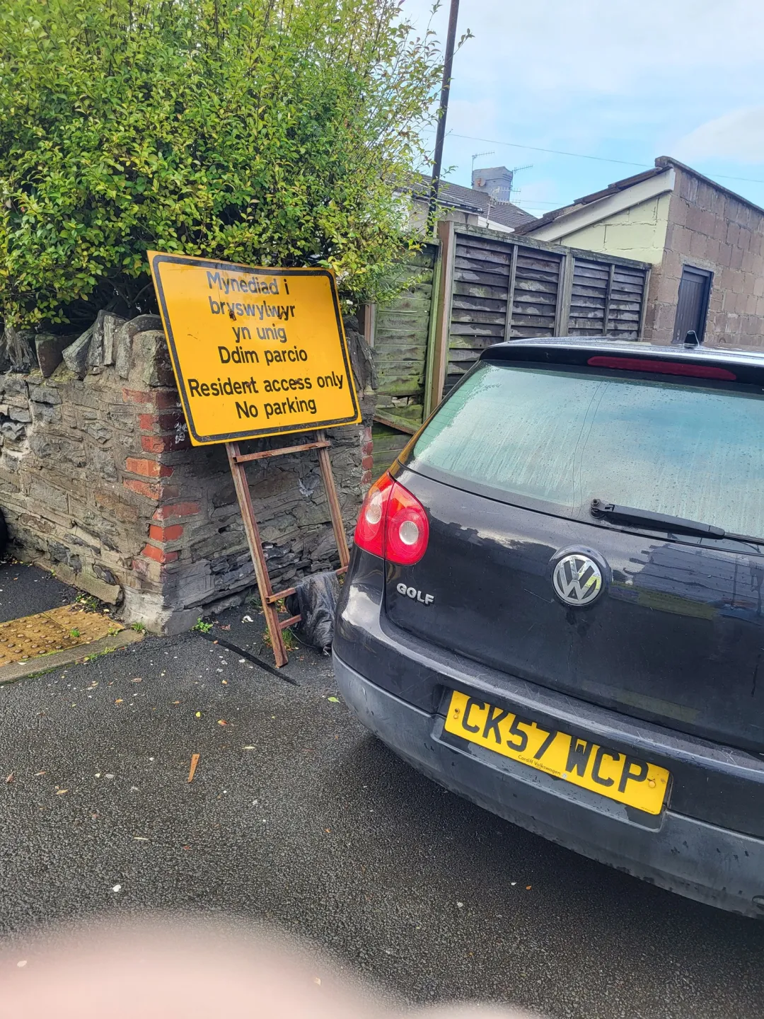 Photo from Jayne's Baby Bank (main page), 28 Nov 2025: Two cars blocking lane. They will be clamped they already have tickets on them and next door can't get their delivery driver car out and the