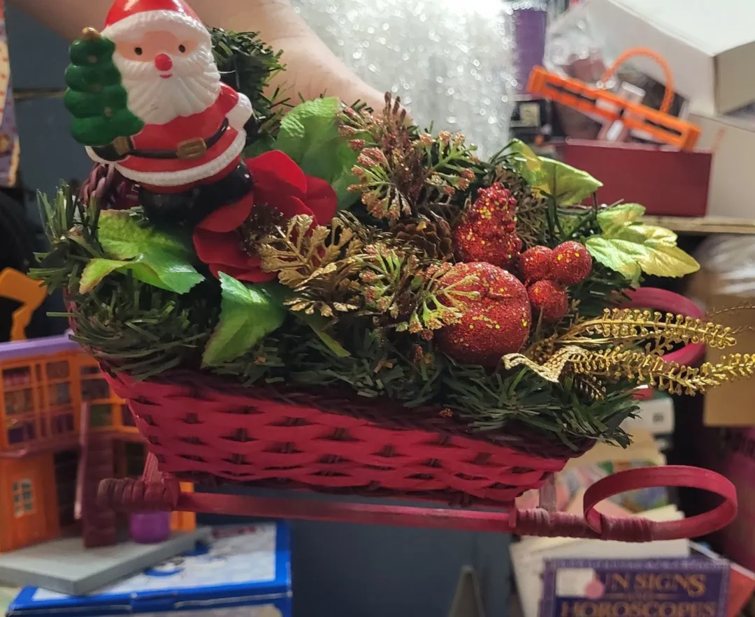 Photo from Jayne's Baby Bank (main page), 10 Aug 2025: Vintahe Centre piece red wicker sleigh £10 please included in the offer Pontypool shop We are taking photos of the items I'm boxes that don'