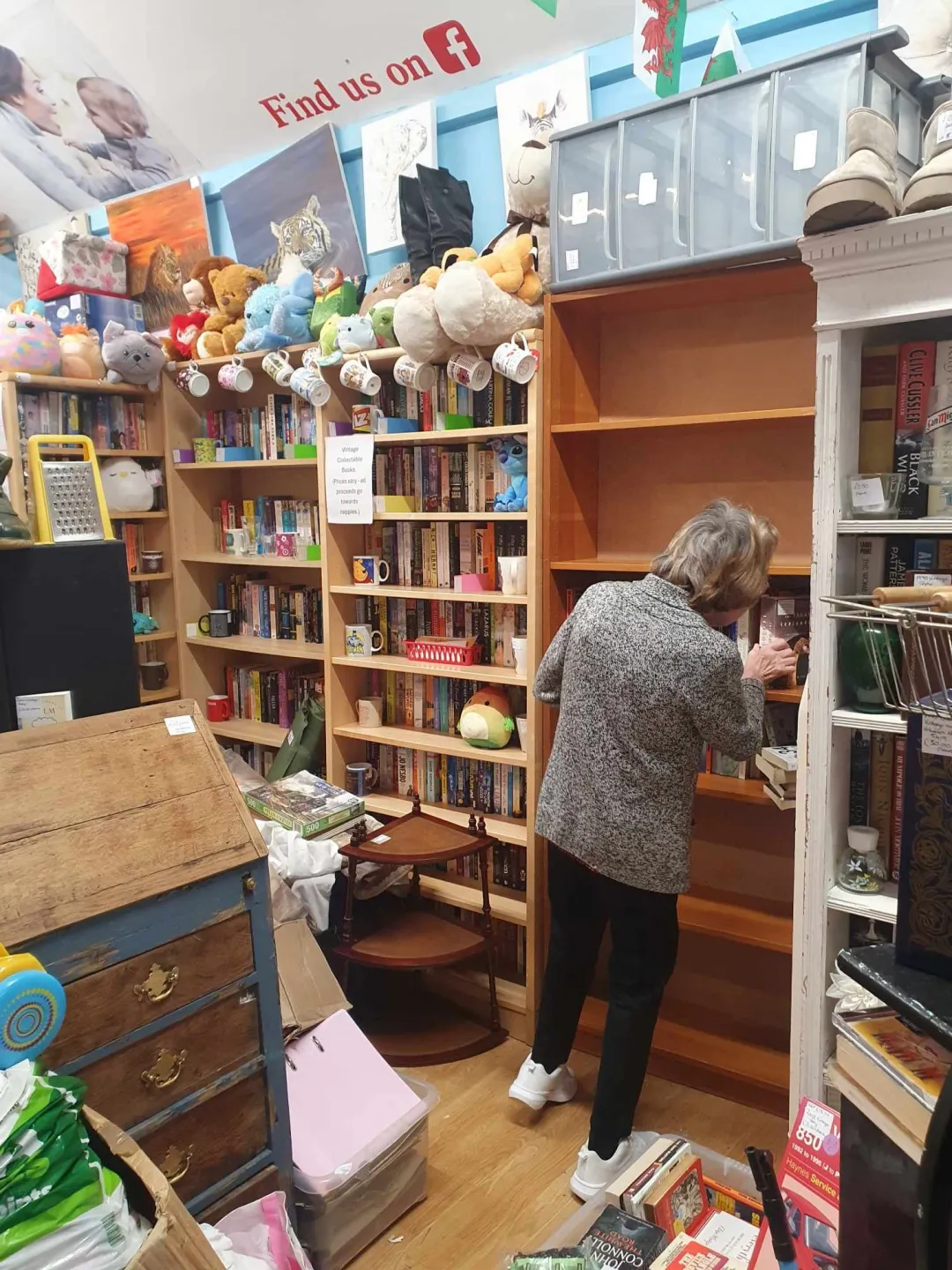 Photo from Jayne's Baby Bank (main page), 19 May 2025: Dawn looks happy with her ever expanding vintage book shops. If you want a chat about authors now would be your chance to pop in a meet Dawn