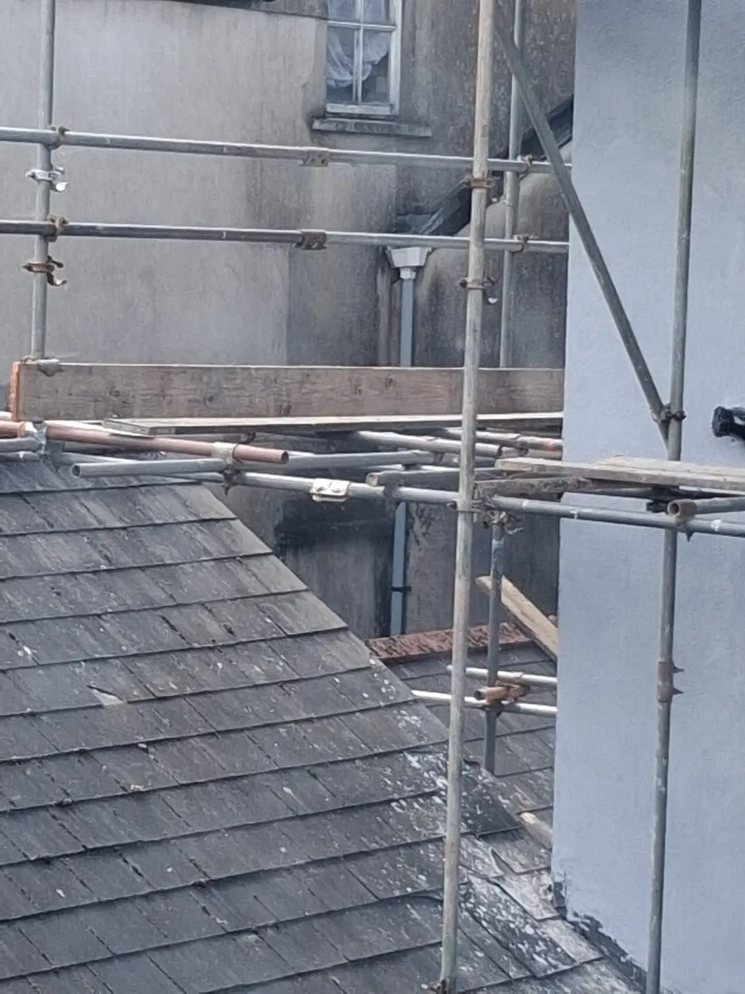 Photo from Jaynesbabybank Registered - cic: Dan was just on the roof and he said that the drain pipe isn't attached up the top part . Drain pipe is directly where is a historic leak in