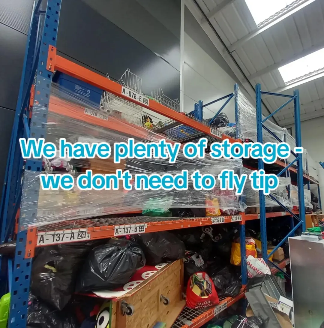 Photo from communityshopone, 8 May 2026: haters : she's fly tipping! us: we don't need to fly tip we have plenty of storage thanks (that's just 1 set of racking we have 4 sets )