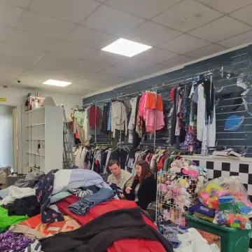 Photo from Jayne's Baby Bank (main page), 2 Jun 2025: Blackwood staff moonlighting in the new shop! All £1 clothes behind them