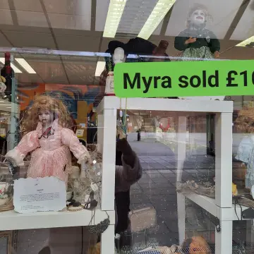 Image from Jayne's Baby Bank (main page), 11 Oct 2024: Another haunted doll sold! £40 reached. Our goal is £230 towards baby jars foodbank shop