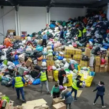 Image from Jayne's Baby Bank (main page), 25 Jul 2025: We need as many volunteers as possible in Pontypool shop Monday and Tuesday please as we have a mountain of donations to clean, check, sort 