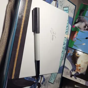 Image from Jayne's Baby Bank (main page), 9 Oct 2025: Behold : the best pen! Netflix and customer PR homework in bed!