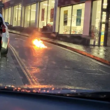 Photo from Jayne's Baby Bank (main page), 9 Feb 2025: This guy in Ponty again. Just set fire to his ruck sack and walked off. Fire crew on their way. 2 police officers, 3 firemen and an engine a