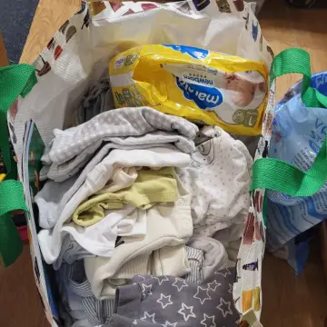 Photo from Jayne's Baby Bank (main page), 7 Feb 2025: Neutral bundle for a Mother ready to be collected. These are made to your specifications by volunteer Mothers and donated by the community b